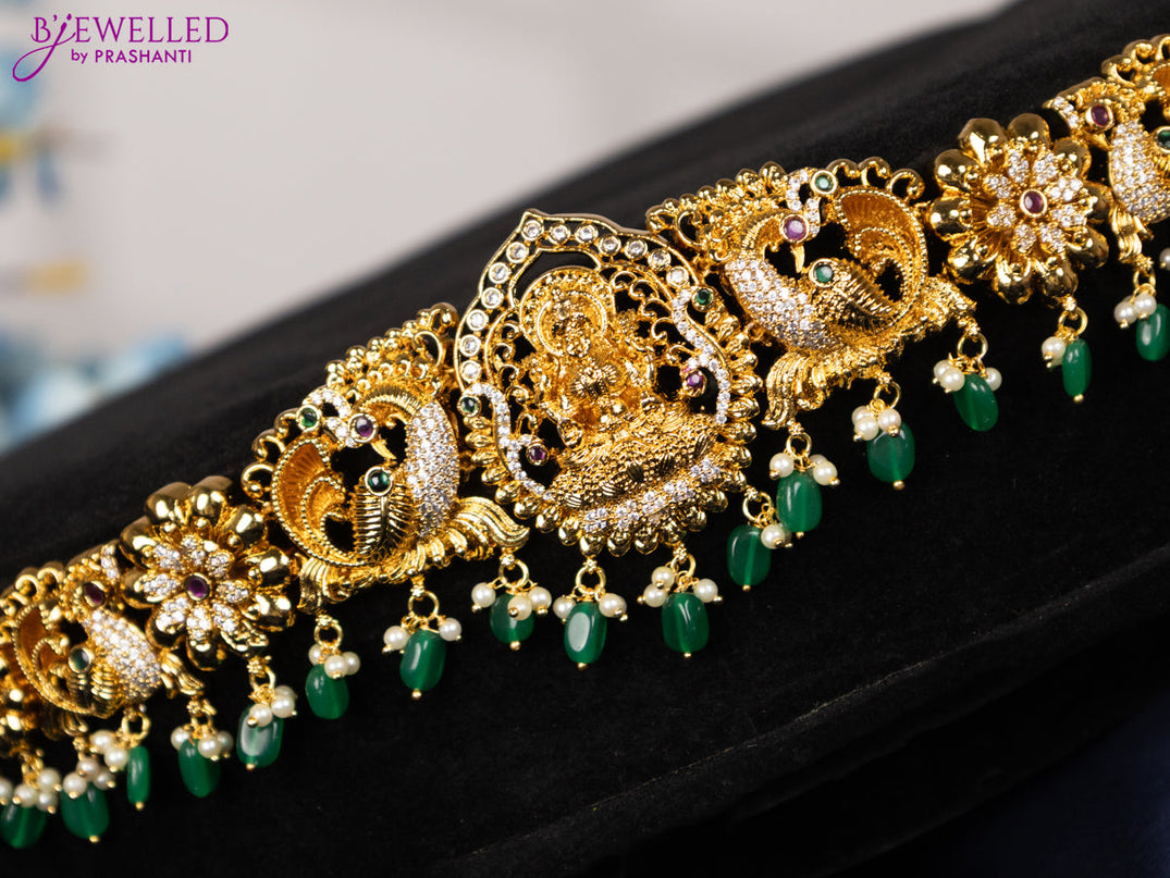 Antique hip chain lakshmi design with kemp & cz stones and pearl & green beads hangings