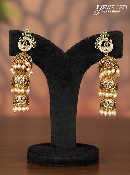 Antique triple layer jhumka with kemp & kundan stones and pearl hangings