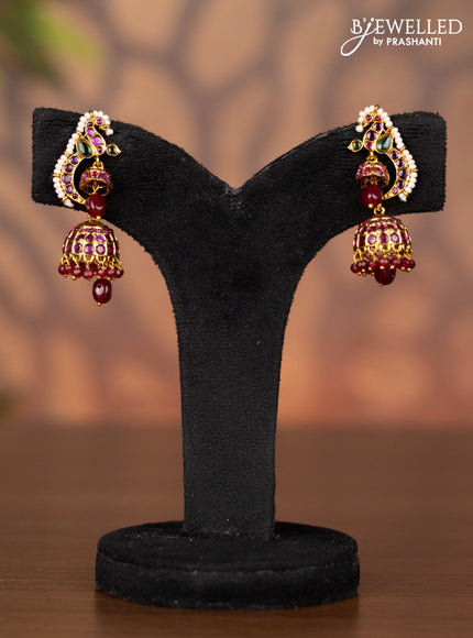 Antique jhumka peacock design with kemp stones and pink beads hangings