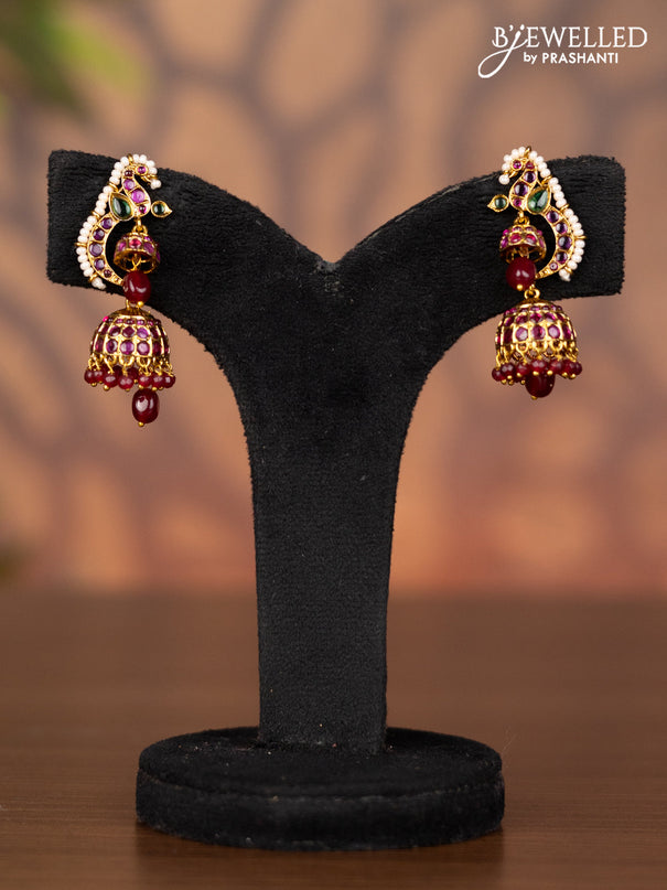 Antique jhumka peacock design with kemp stones and pink beads hangings