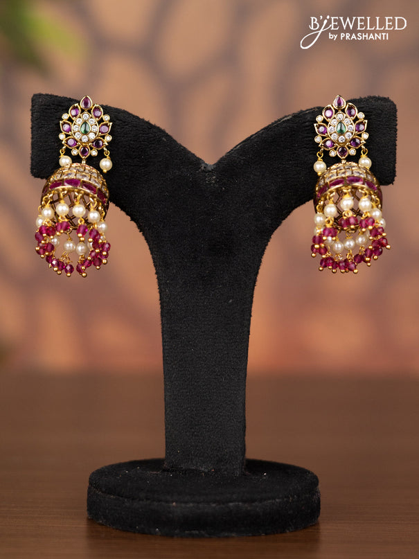 Antique jhumka with kemp & kundan stones and pearl & pink beads hangings