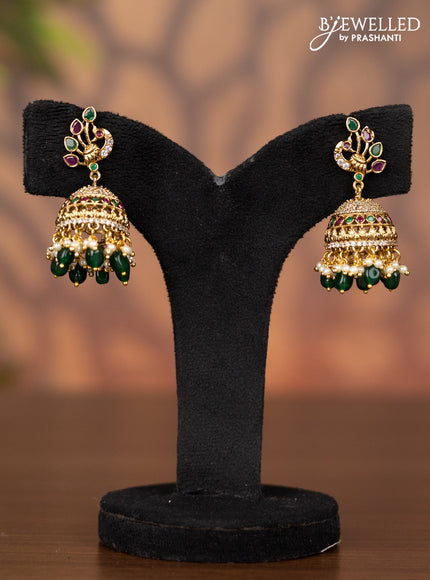 Antique jhumka peacock design with kemp & cz stones and pearl & green beads hangings