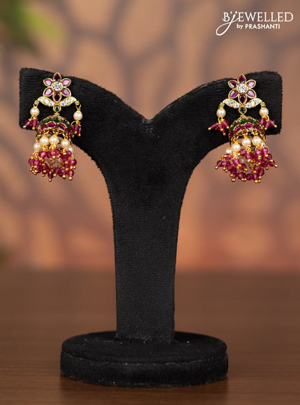 Antique jhumka floral design with kemp & cz stones and pearl & pink beads hangings