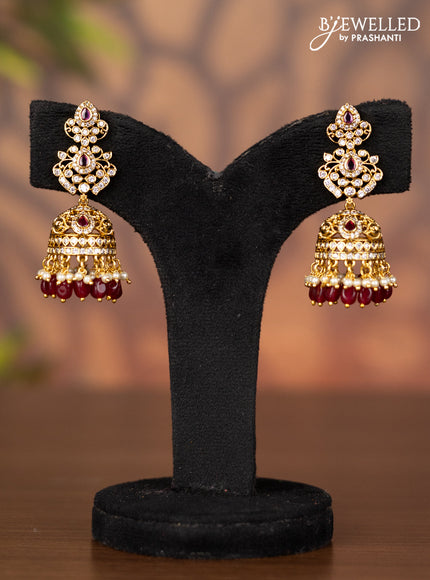 Antique jhumka with kemp & cz stones and pearl & pink beads hangings