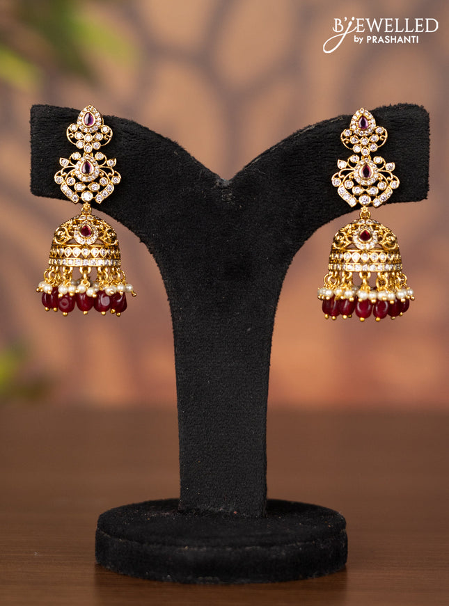 Antique jhumka with kemp & cz stones and pearl & pink beads hangings