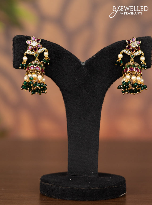 Antique jhumka floral design with kemp & kundan stones and pearl & green beads hangings