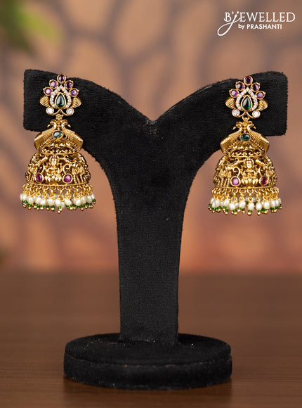 Antique jhumka peacock design with kemp & cz stones and pearl hangings