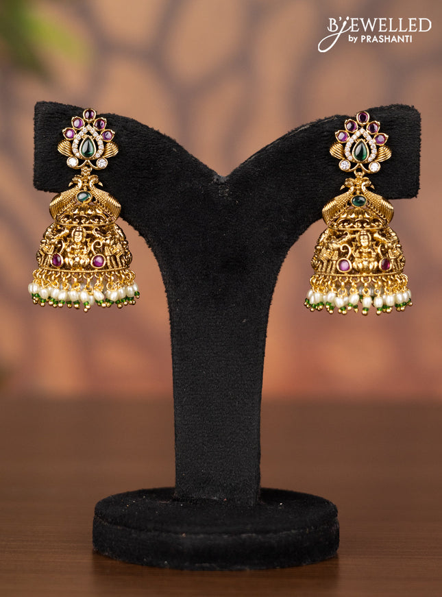 Antique jhumka peacock design with kemp & cz stones and pearl hangings