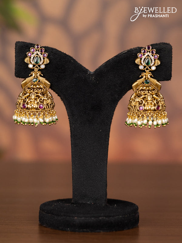 Antique jhumka peacock design with kemp & cz stones and pearl hangings