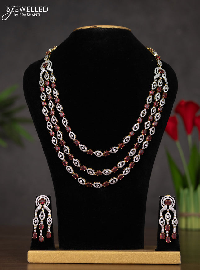 Zircon triple layer haaram with ruby and cz stones in gold finish