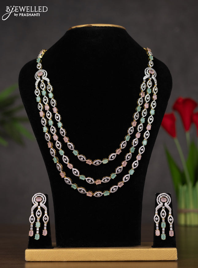 Zircon triple layer haaram with mint green & baby pink and cz stones in gold finish