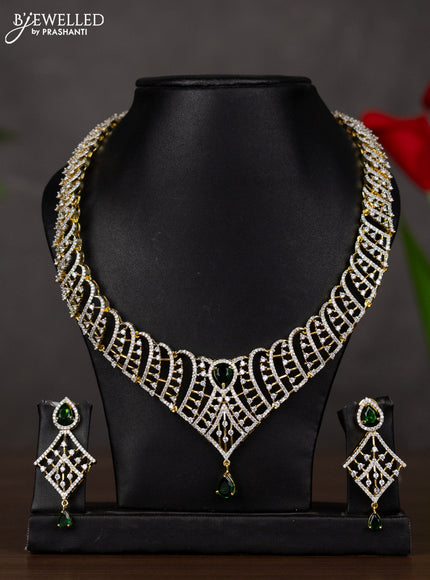 Zircon haaram with emerald and cz stones in gold finish