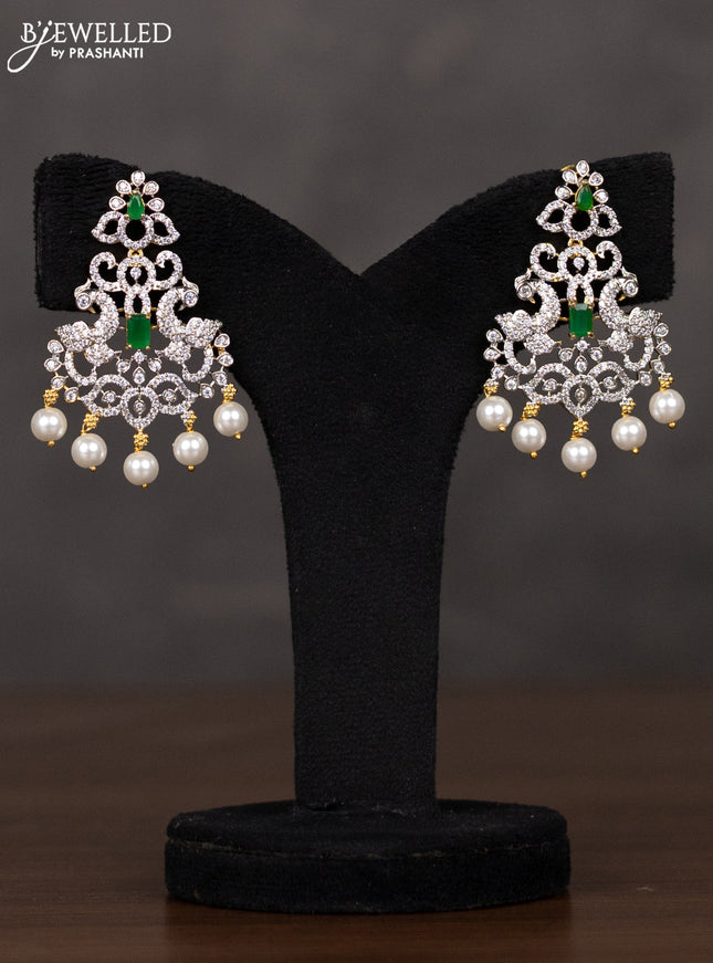 Zircon haaram peacock design with emerald & cz stones and pearl hangings in gold finish