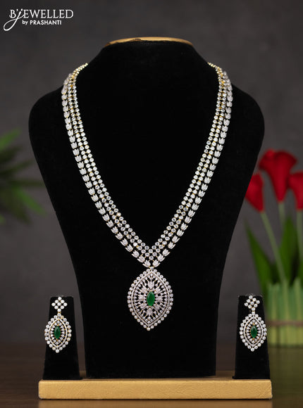 Zircon haaram with emerald and cz stones in gold finish