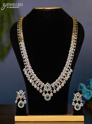 Zircon haaram with emerald and cz stones in gold finish