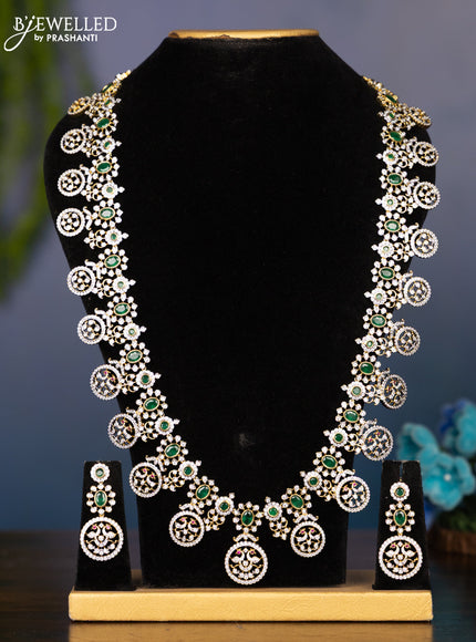 Zircon haaram bottumala design with emerald and cz stones in gold finish