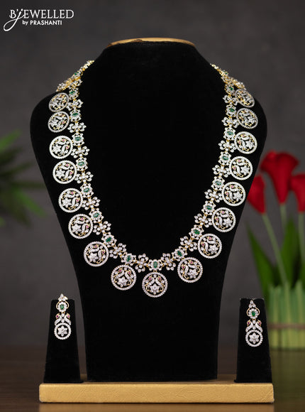 Zircon haaram bottumala design with emerald and cz stones in gold finish