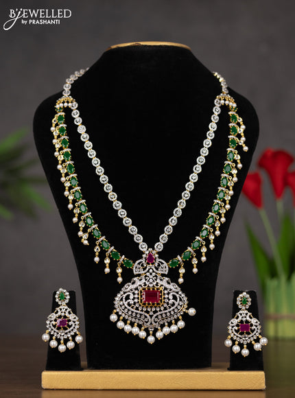 Zircon triple layer haaram with kemp & cz stones and pearl hangings in gold finish