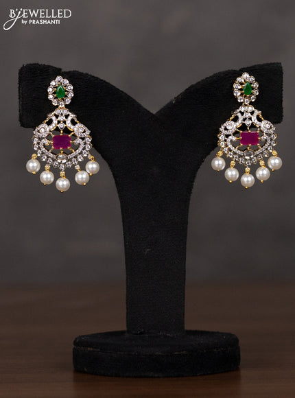 Zircon triple layer haaram with kemp & cz stones and pearl hangings in gold finish