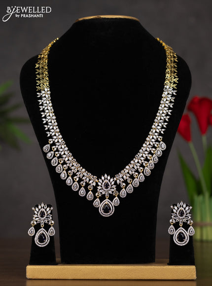 Zircon haaram with purple and cz stones in gold finish