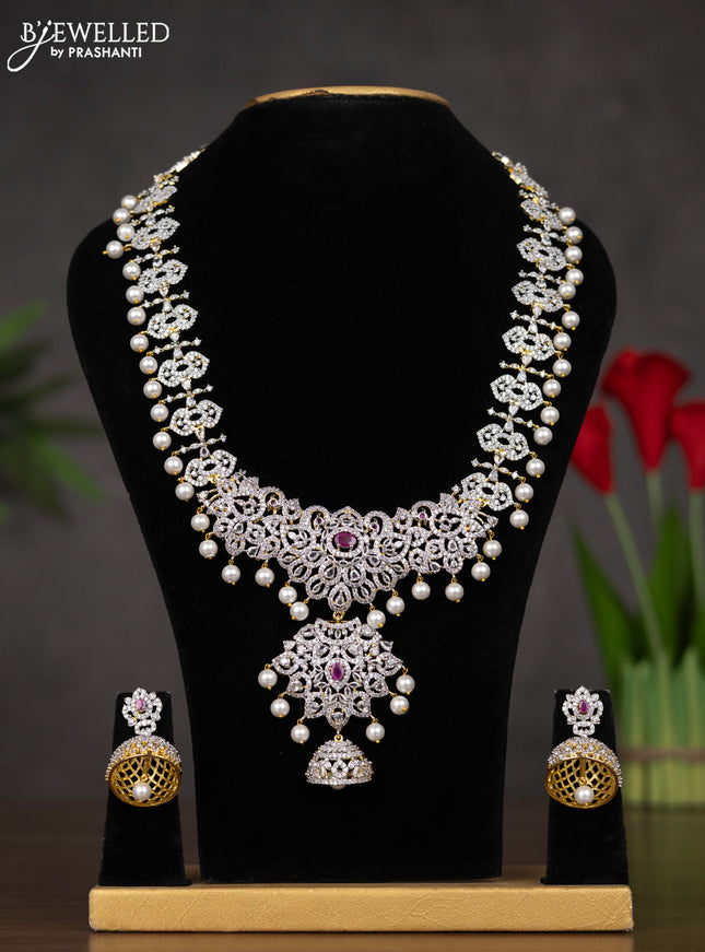 Zircon haaram with ruby & cz stones and pearl hangings in gold finish