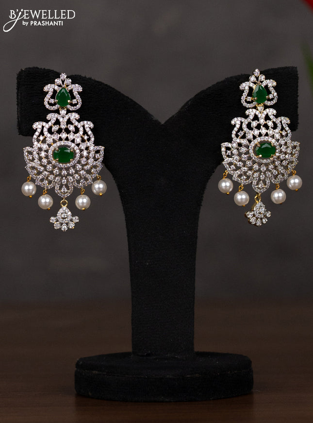 Zircon haaram with emerald & cz stones and pearl hangings in gold finish