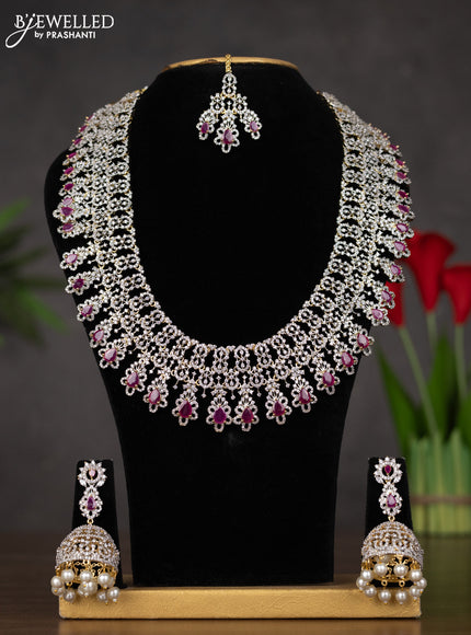 Zircon haaram with maang tikka and ruby & cz stones in gold finish