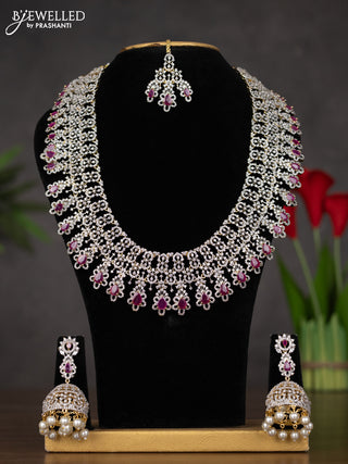 Zircon haaram with maang tikka and ruby & cz stones in gold finish