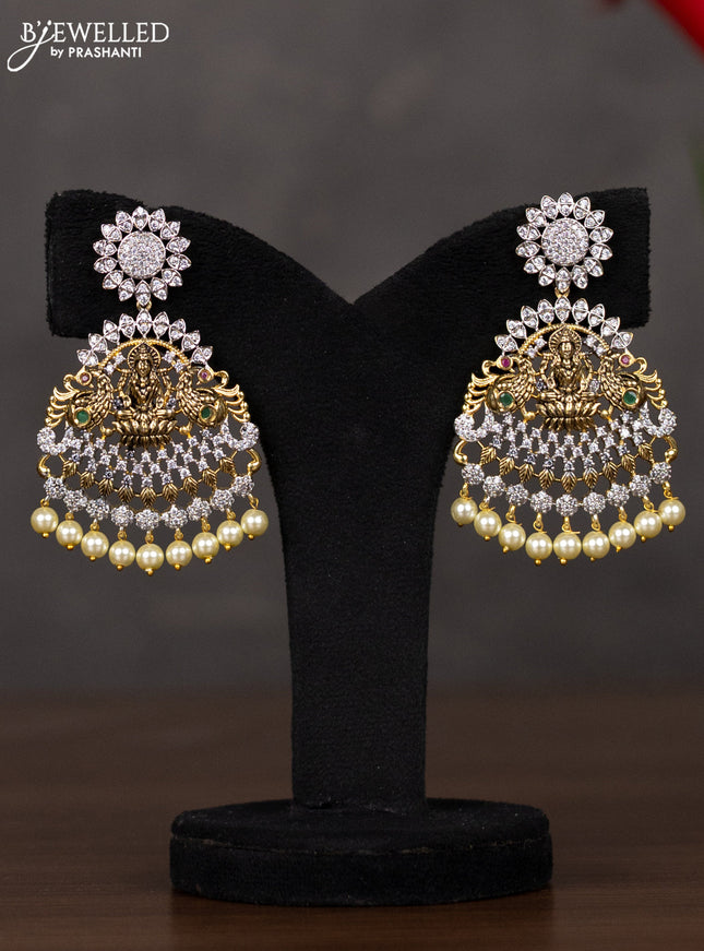 Zircon haaram lakshmi design with kemp & cz stones and pearl hangings in gold finish
