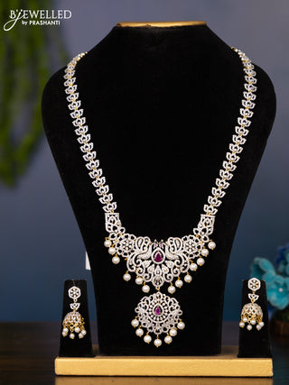 Zircon haaram with ruby & cz stones and pearl hangings in gold finish