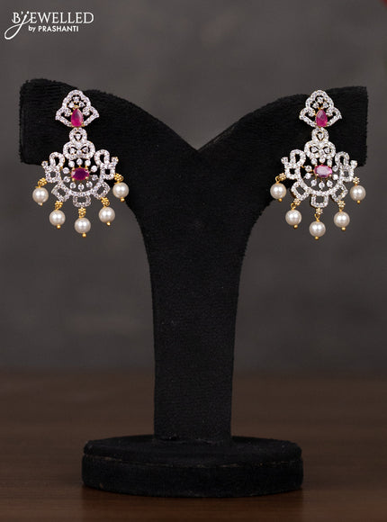 Zircon haaram with ruby & cz stones and pearl hangings in gold finish