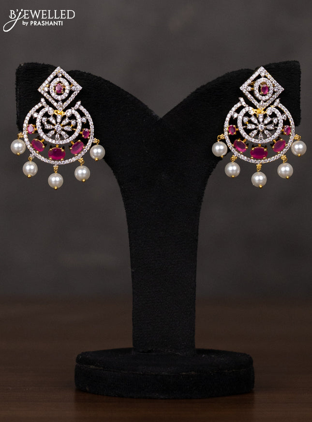 Zircon haaram with ruby & cz stones and pearl hangings in gold finish