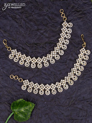 Antique zircon maatal with loop & flower deisgn in cz stones