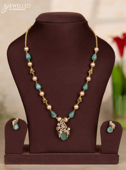 Beaded teal necklace with parrot design in victorian finish