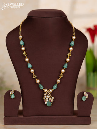 Beaded teal necklace with parrot design in victorian finish