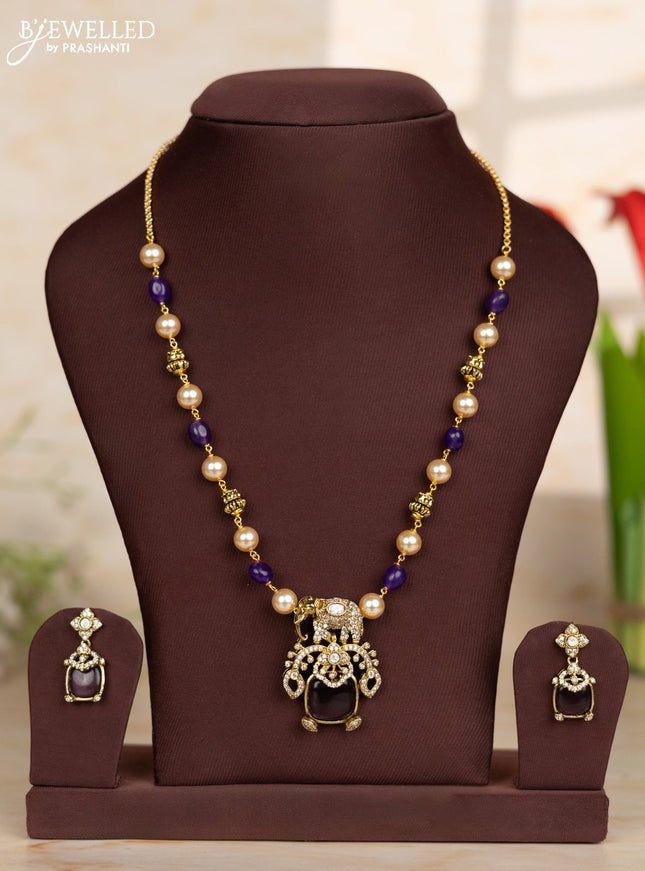 Beaded purple necklace with elephant design in victorian finish