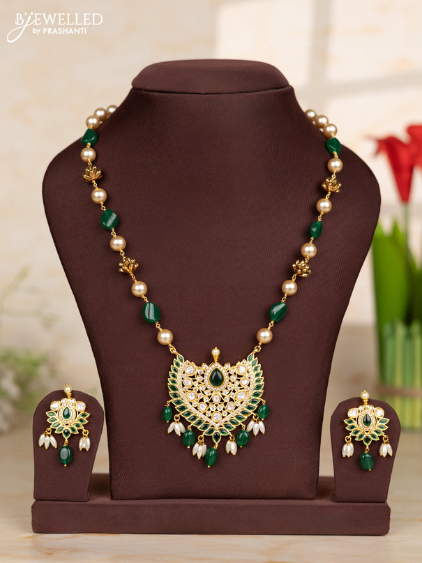 Beaded green necklace with pendant in green and white stones in victorian finish