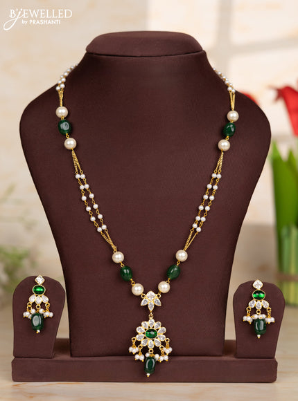 Beaded green necklace with floral pendant in victorian finish