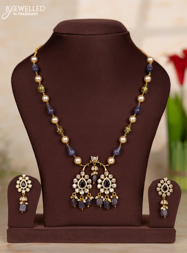 Beaded purple necklace with tear drop shape pendant in victorian finish
