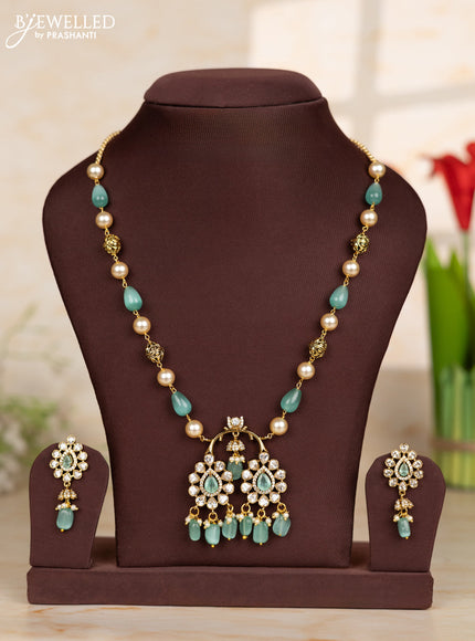 Beaded teal necklace with tear drop shape pendant in victorian finish