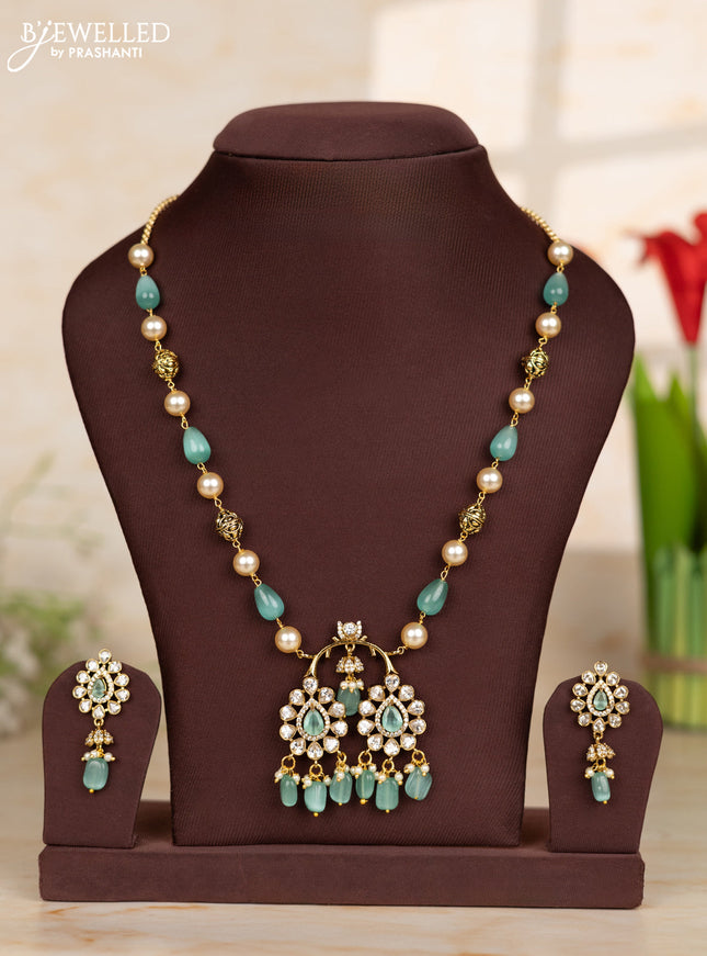 Beaded teal necklace with tear drop shape pendant in victorian finish