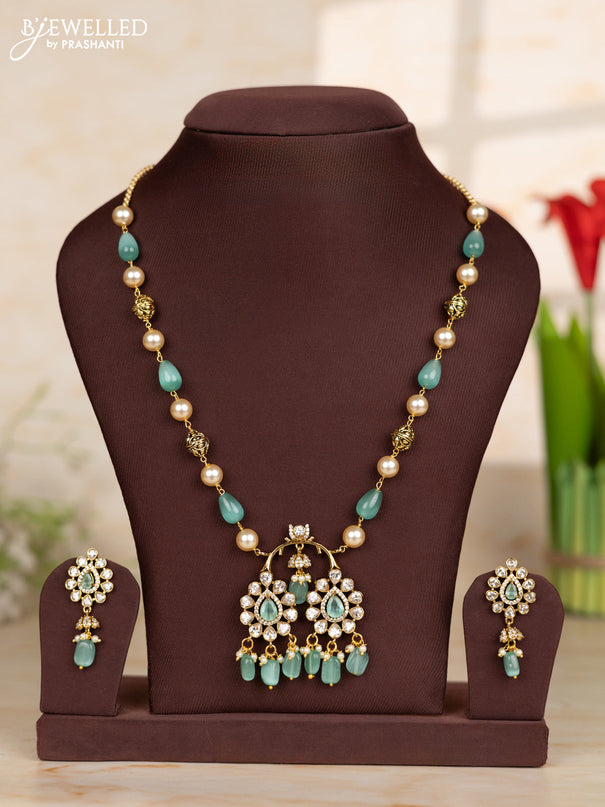 Beaded teal necklace with tear drop shape pendant in victorian finish