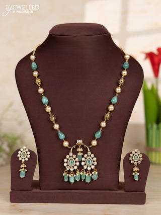 Beaded teal necklace with tear drop shape pendant in victorian finish