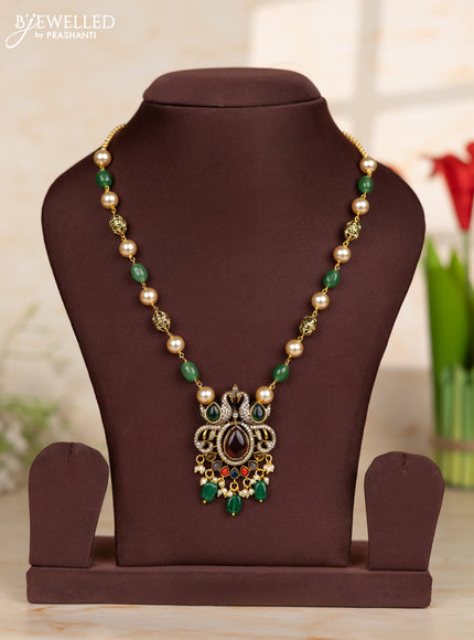 Beaded green necklace with double peacock design in victorian finish