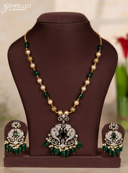 Beaded green necklace with elephant design pendant in victorian finish