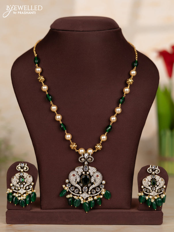 Beaded green necklace with elephant design pendant in victorian finish