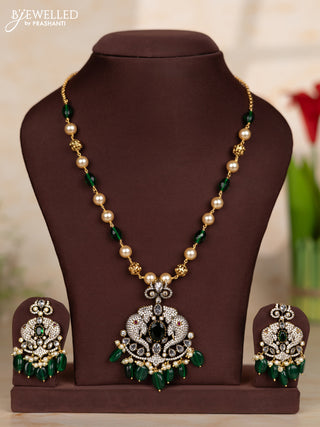 Beaded green necklace with elephant design pendant in victorian finish