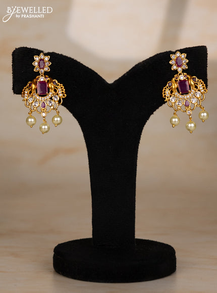 Beaded maroon necklace with double peacock design in white and ruby stones and pearl hanging