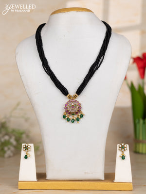 Beaded black necklace with chandbali pendant in kemp and pearl hanging