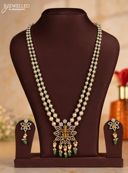 Pearl necklace with teal beads and lakshmi pendant with cz stones and pearl hanging